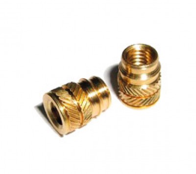 Vibratory feeding system for threaded metal inserts