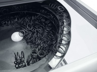 Feeding system for rear view mirror components