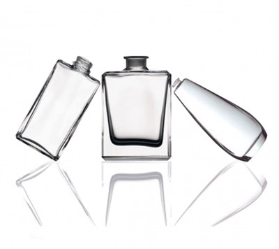 Mechanical feeding system for cosmetic crystal bottles with irregular shapes