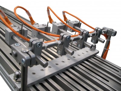 Mechanical feeding system for coffee capsules with multi-rails